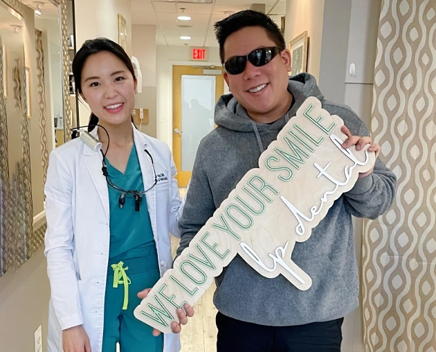 LP Dental of Falls Church dentist with a happy patient